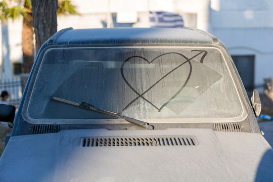 Dirty Car Window With Drawn Heart