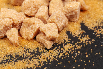 Rock sugar on dark background close up