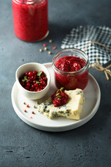 Homemade berry chutney with blue cheese