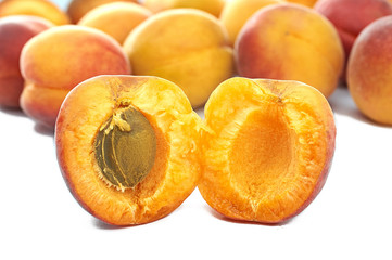 apricot yellow red sweet juicy fruit on a white background