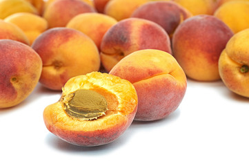 apricot yellow red sweet juicy fruit on a white background