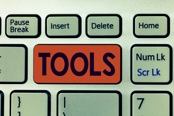 Writing note showing Tools. Business photo showcasing device implement like held and used carry out particular function.