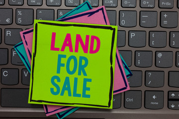 Handwriting text writing Land For Sale. Concept meaning Real Estate Lot Selling Developers Realtors Investment Papers reminders keyboard Inspiration communicate Annotations Type computer