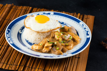 chicken and mushroom stroganoff over white rice and egg