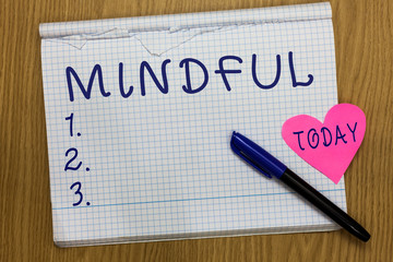 Writing note showing Mindful. Business photo showcasing Conscious Aware of something Inclined Willing to do Meditation Square Notebook ripped pages marker heart romantic ideas wooden table