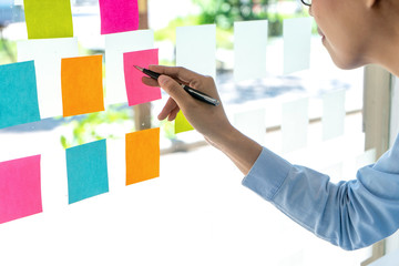 Young businesspeople use their hand