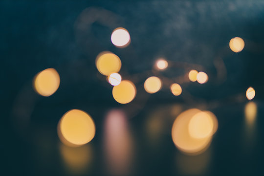 Bokeh Of Golden String Lights Backgroung Shot