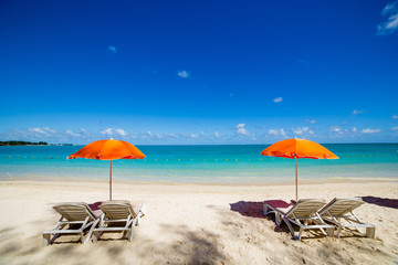 Parasols and sand beach in Mauritius island