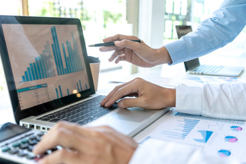 businessman in meeting analysis chart graphy
