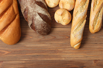 Different types of bread on the table top view. Bakery products.