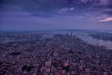 Obraz premium Aerial view of New York city. Dark photo in the evening.