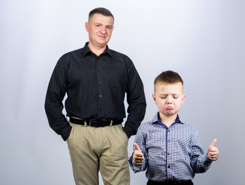 sad kid. small boy with dad businessman. father and son in business suit. male fashion. childhood. trust and values. fathers day. happy child with father. business partner. family day. dont be sad