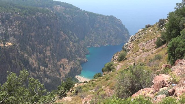 Above the Butterfly Valley, Fethiye, Turkey - 12th of June 2019: 4K Panorama of the Butterfly Valley from the mountain above