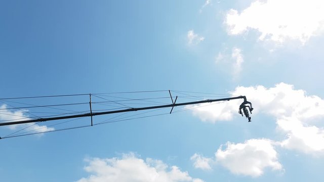 4K cinema production camera with crane in the blue sky