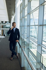 Businessman using smartphone at work