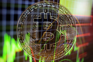 Binary options chart, trading statistics. Bitcoin and cryptocurrency investing. Concept with bitcoins and candle graph on background.