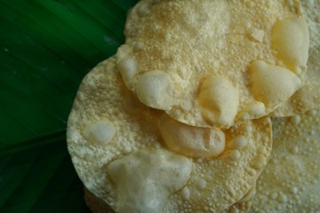 Papad or Papadum - crispy deep fried Indian snack made of lentil
