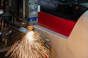 The fiber laser cutting machine cutting the stainless tube. The hi-technology sheet metal...