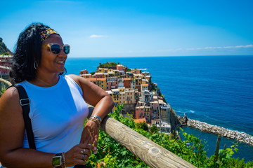 Fototapeta na wymiar Woman On Vacation In Cinque Terre Italy