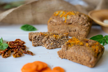 Dietary bread without yeast from whole grain flour. Healthy food, bread with vegetables and bran.