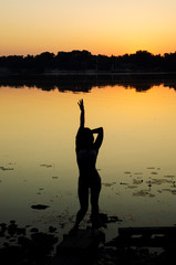 silhouette of a woman on sunset