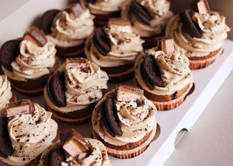 Tasty cupcakes. Homemade chocolate muffin with Vanilla Cheese Cream. Delicious sweet dessert.