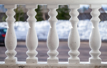 White balusters in a row, classic handrails