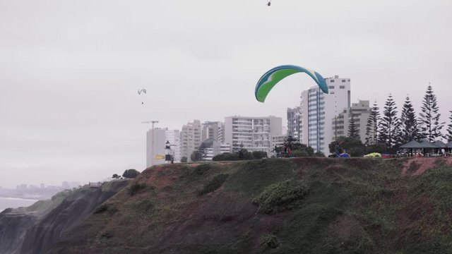 Paragliding in Lima, Peru, Miraflores district. Extreme sport and adventure in South American capital city
