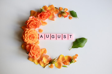 August text pink tile, with roses, on a white background.