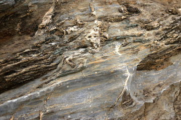 Background texture of rough cliff rock wall
