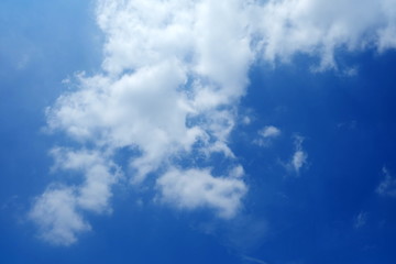 White Cloud with Cool Blue Sky Background.