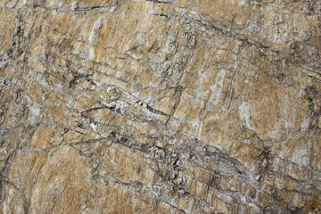 Background texture of rough cliff rock wall