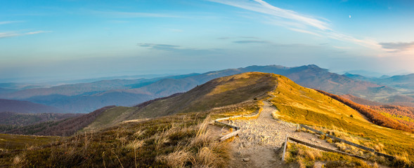 Mountain landscape at sunset in autumn. Mountain peak meadow.  © Ornavi