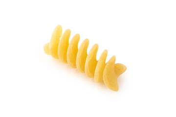 Yellow Rotini shape of pasta on white background isolated