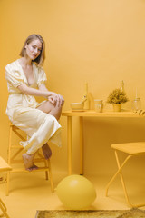 Portrait of woman in a yellow scene