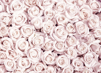 Background from small rosebuds of gentle pastel shades.