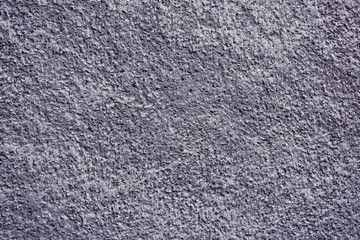 Cement plastered stone wall. Texture, design, background.