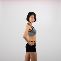 Obraz premium sporty woman in sportswear on white background. healthy sport fitness lifestyle