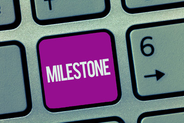 Text sign showing Milestone. Conceptual photo Significant stage or event in the development of...