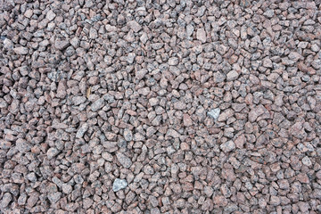 Red granite crumb, background, texture, red granite gravel