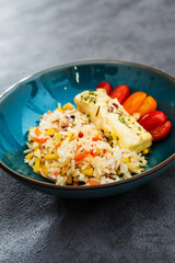 Andalusian fish, saffron rice with vegetables