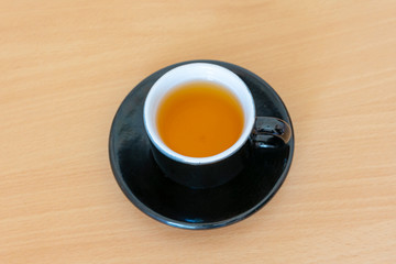 Cup of tea on wooden table