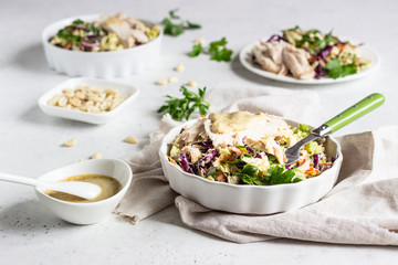 Red and chinese cabbage, carrot salad with roasted turkey. Coleslaw for autumn or winter season. Healthy food.