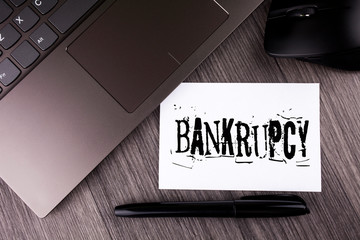 Writing note showing Bankrupcy. Business photo showcasing Company under financial crisis goes...
