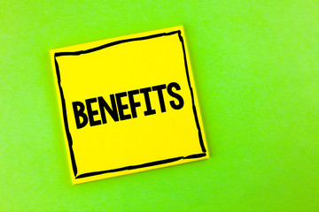 Handwriting text Benefits. Concept meaning hike in allowance for senior employees of the company written Yellow Sticky Note Paper the plain background.