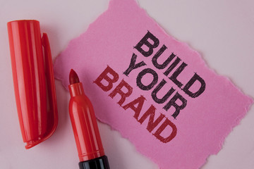 Handwriting text Build Your Brand. Concept meaning create your own logo slogan Model Advertising E...