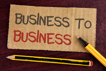 Text sign showing Business To Business. Conceptual photo Working ground businessman busy work hard stop playing written Cardboard Piece wooden background Led Pen and Pencil next to it.