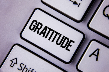 Handwriting text Gratitude. Concept meaning Quality of being thankful Appreciation Thankfulness Acknowledge written the White Keyboard Key with copy space. Top view.