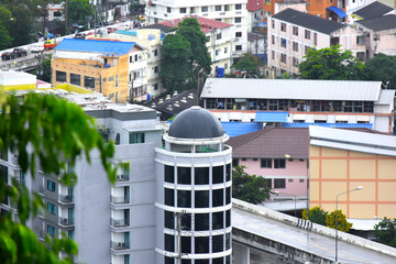  Looking from the height See a city in a tight city with tall buildings and beautiful skies. Is a...