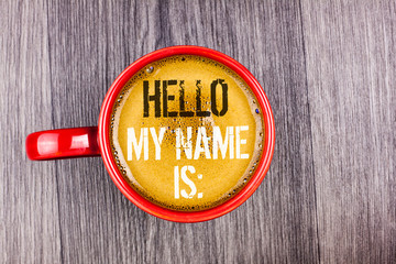 Writing note showing Hello My Name Is. Business photo showcasing meeting someone new Introduction Interview Presentation written Coffee in Red Cup the Grey wooden background. Top view.